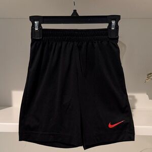 Nike Black Performance Shorts with Red Swoosh